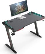 DESK-GT-02 GAMING DESK GT 02 810x700x150MM GT-02 Z-Shaped RGB Gaming Desk – 140×60×73 cm Carbon-Fibre Surface, Dual Cable Grommets, Cup & Headphone Holders, Steel Frame Stability, Customizable RGB Edge Lighting , Foldable & Compact GT-02 RGB Gaming Table – 140×60cm Carbon Fiber Surface, Z-Shaped Metal Frame, RGB LED Lights, Cup Holder, Headset Hook, Dual Cable Ports, Steel Frame Stability, Customizable RGB Edge Lighting , Foldable & Compact