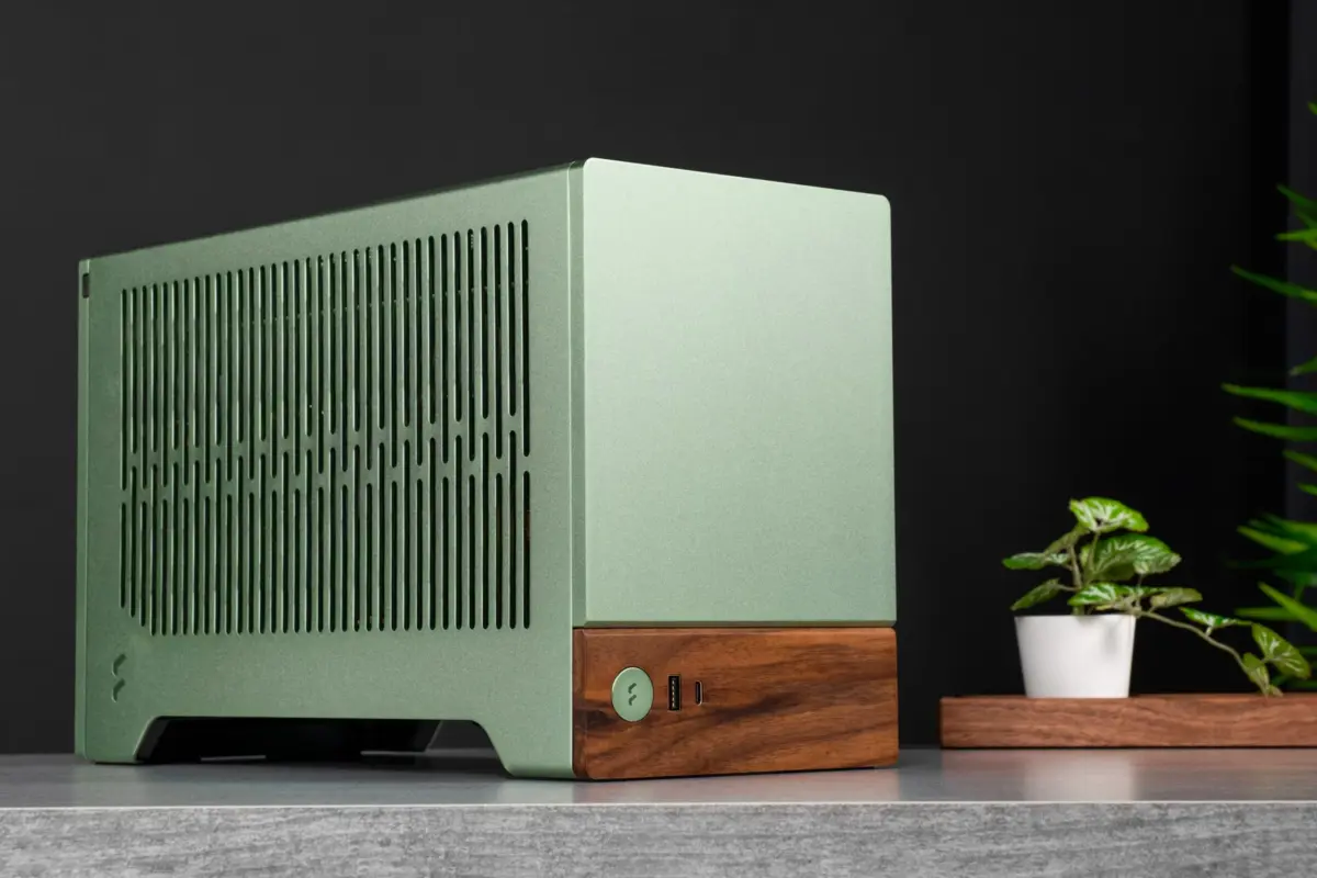 FD-C-TER1N-01 FRACTAL DESIGN TERRA GRAPHITE MINI ITX USB 3.2 CASE Fractal Terra Graphite Mini-ITX Case With Solid Walnut Front, 8mm Aluminum Panel, PCIe 4.0 Riser, Adjustable Spine, 322mm GPU Support, SFX PSU, Dual SSD Mounts ~ FD-C-TER1N-01